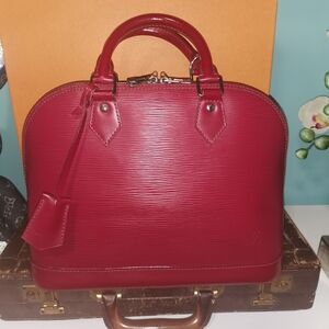 💯% Authentic LV Alma In Red